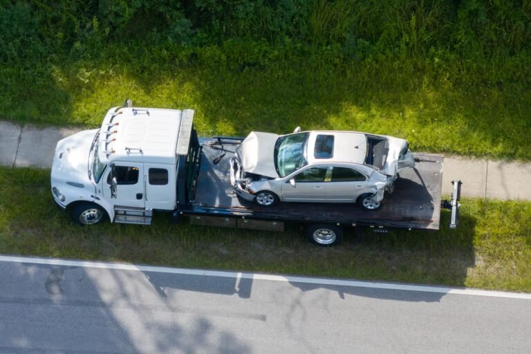 two cars stopped on the shoulder after a collision on Highway 1 in Santa Cruz County with hazard lights on